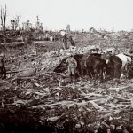 An archive picture shows soldiers and horses amid a destroyed spot on the battlefield at Maurepas on the Somme front, northern France